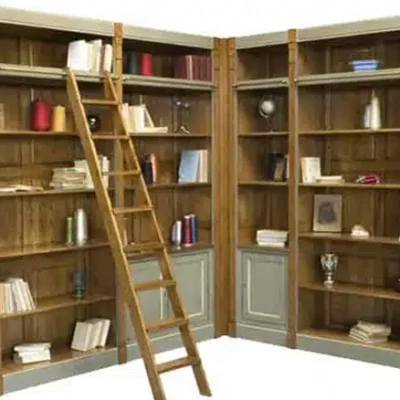 Bibliothèque d’angle sur mesure en merisier réalisée par Meubles Mignot