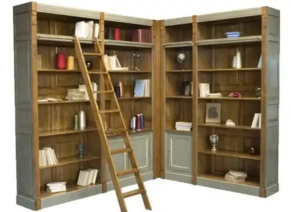 Bibliothèque d’angle sur mesure en merisier réalisée par Meubles Mignot